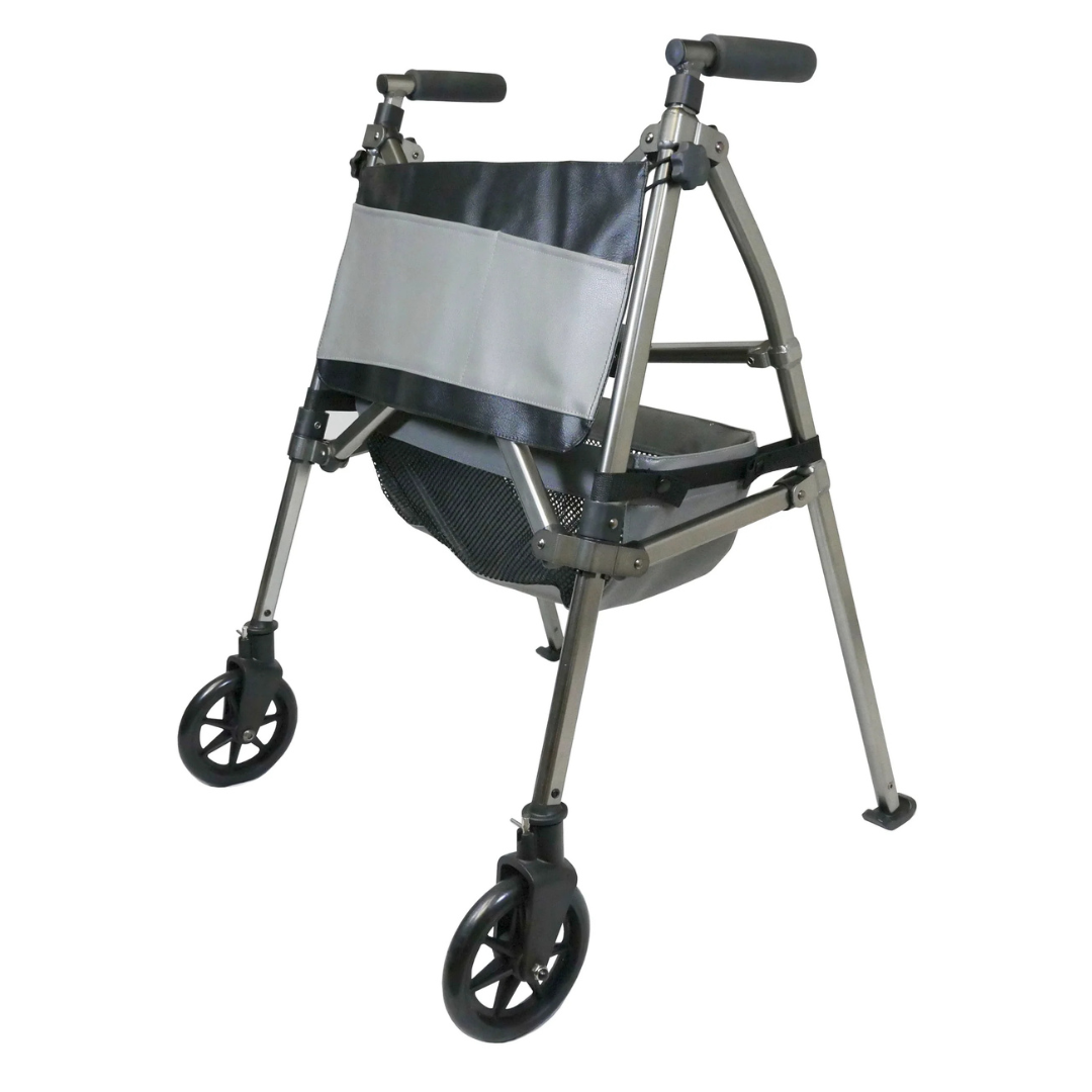 The Signature Life Elite Bariatric Travel Walker is a lightweight, foldable walker with four wheels, black handles, a gray fabric storage pouch, and a mesh basket underneath to assist with mobility.